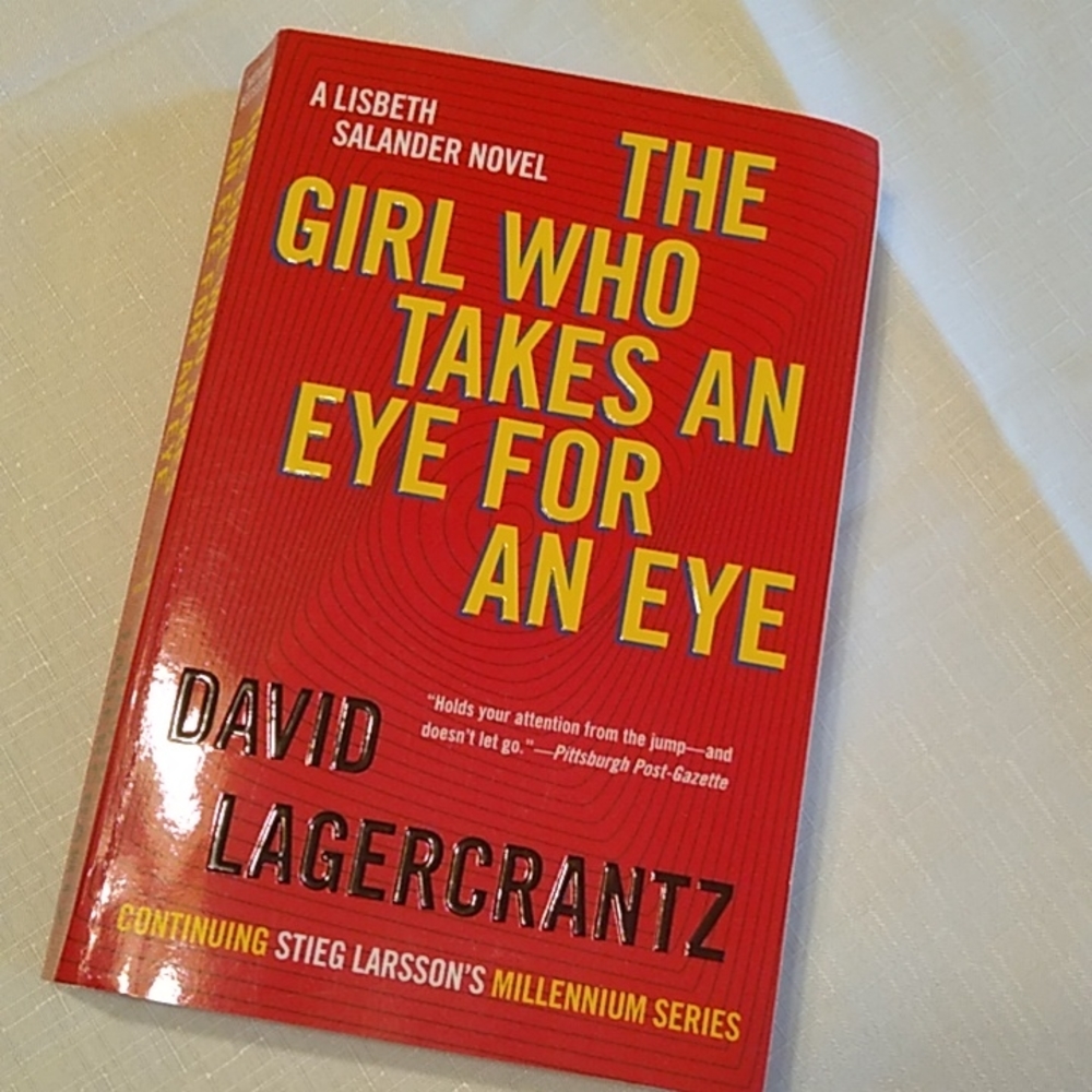 THE GIRL WHO TAKES AN EYE FOR AN EYE Paperback book